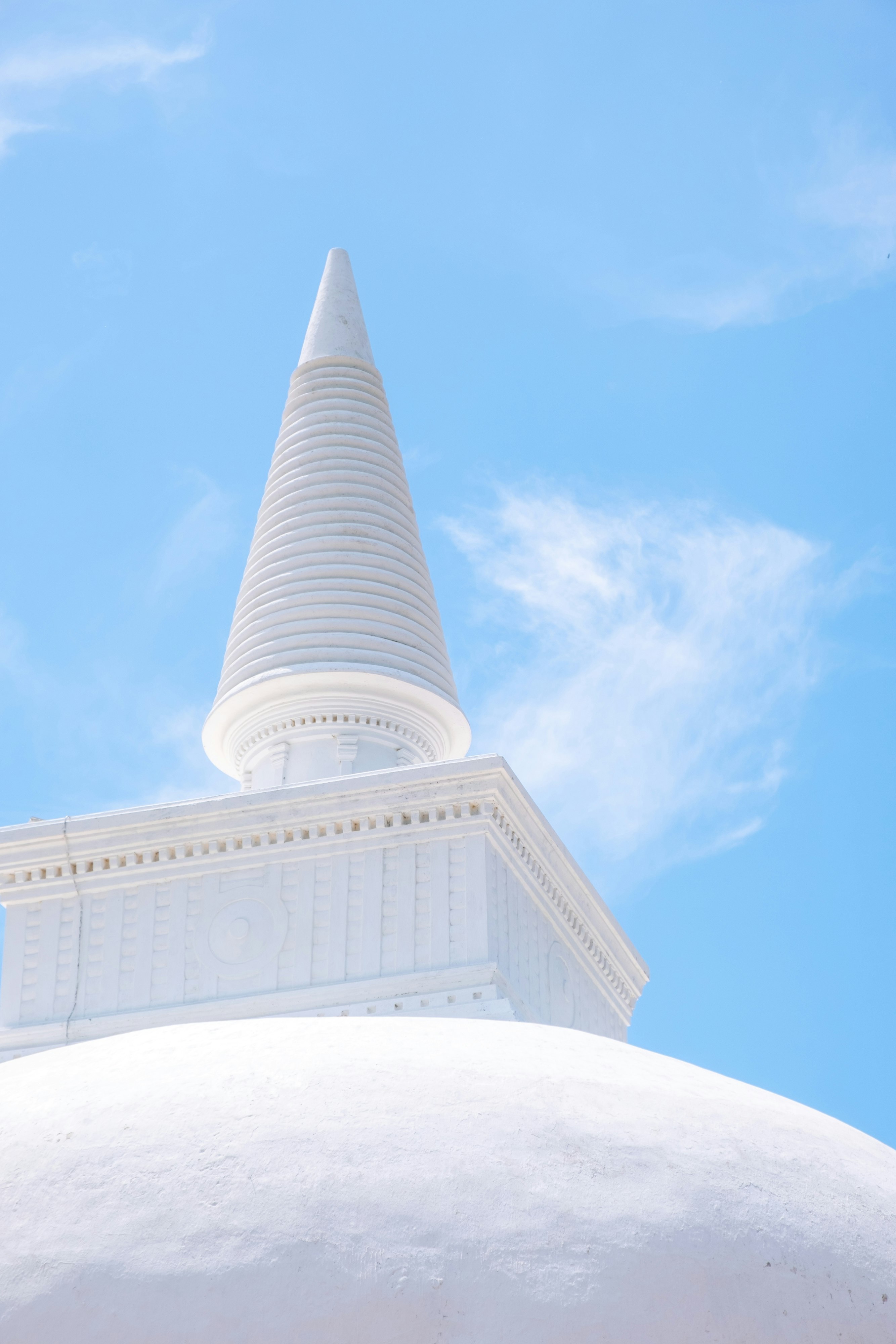 white concrete building under blue sky during daytime